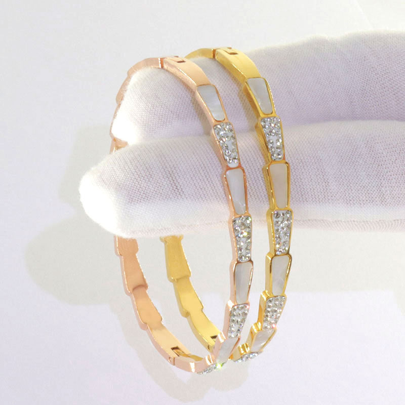 Classic style snake bone shaped gold-plated white shell mud diamond bracelet titanium steel bracelet
